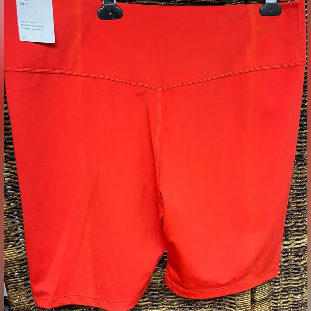 Nike Women's Red Shorts-XXL, tags, sun fade lines ( please see images).‎